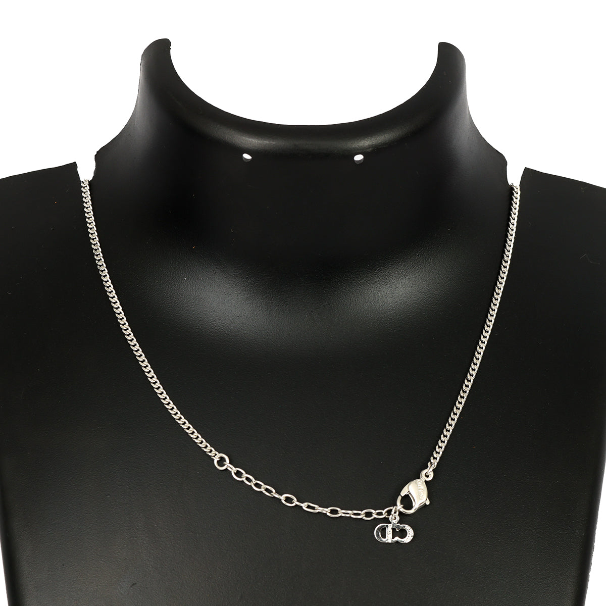 CHRISTIAN DIOR SILVER-TONE OVAL PENDANT WITH CRYSTAL DIOR LOGO