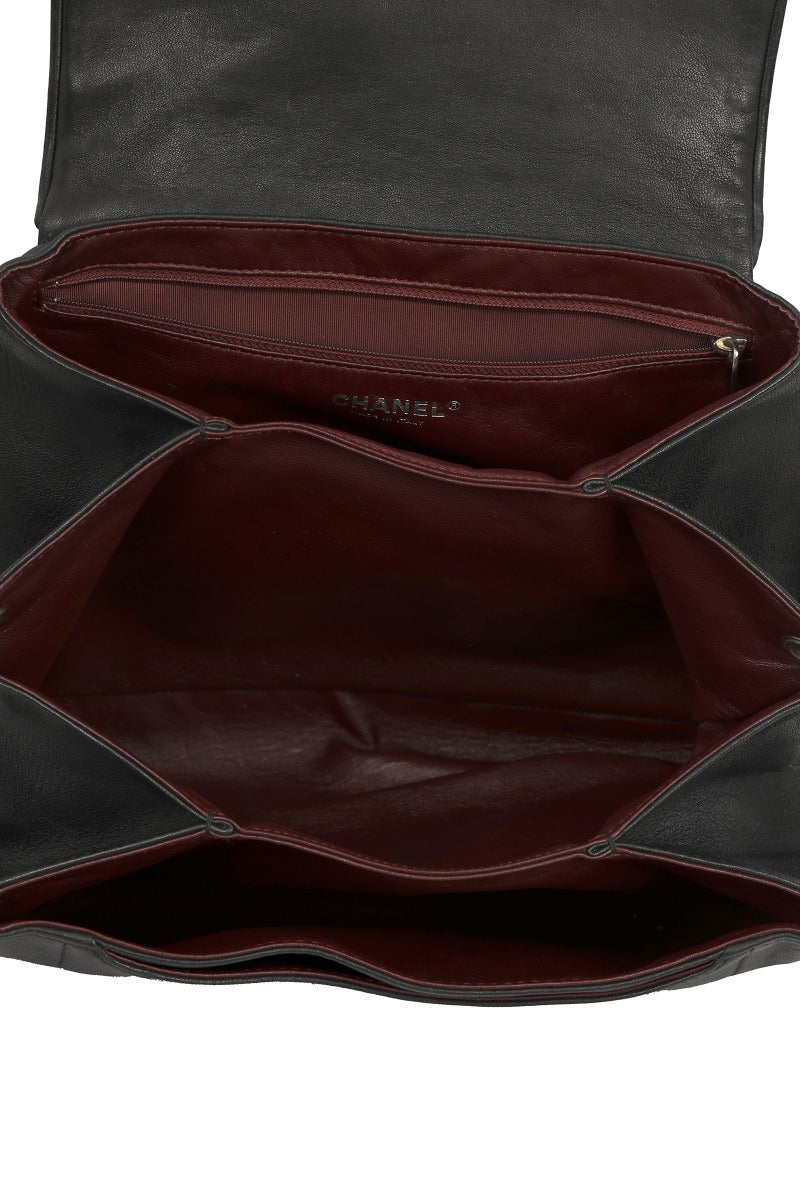 chanel-black-quilted-leather-chain-around-accordian-flap-bag