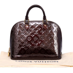 LOUIS VUITTON AMARANTE ALMA PM PATENT LEATHER HANDBAG