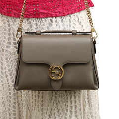 GUCCI DOLLAR G INTERLOCKING LOGO SLING BAG