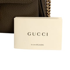 GUCCI DOLLAR G INTERLOCKING LOGO SLING BAG
