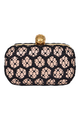 alexander-mcqueen-skull-clutch