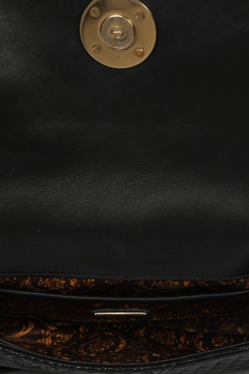 gianni-versace-black-patent-leather-medusa-head-tassel-shoulder-bag