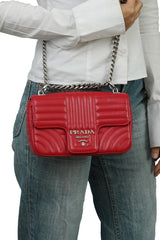 prada-red-quilted-leather-diagramme-sling-bag