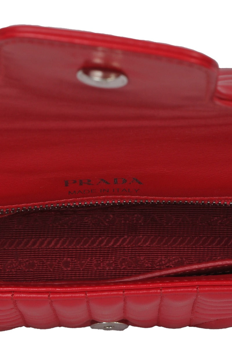 prada-red-quilted-leather-diagramme-sling-bag
