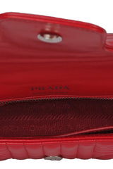 prada-red-quilted-leather-diagramme-sling-bag