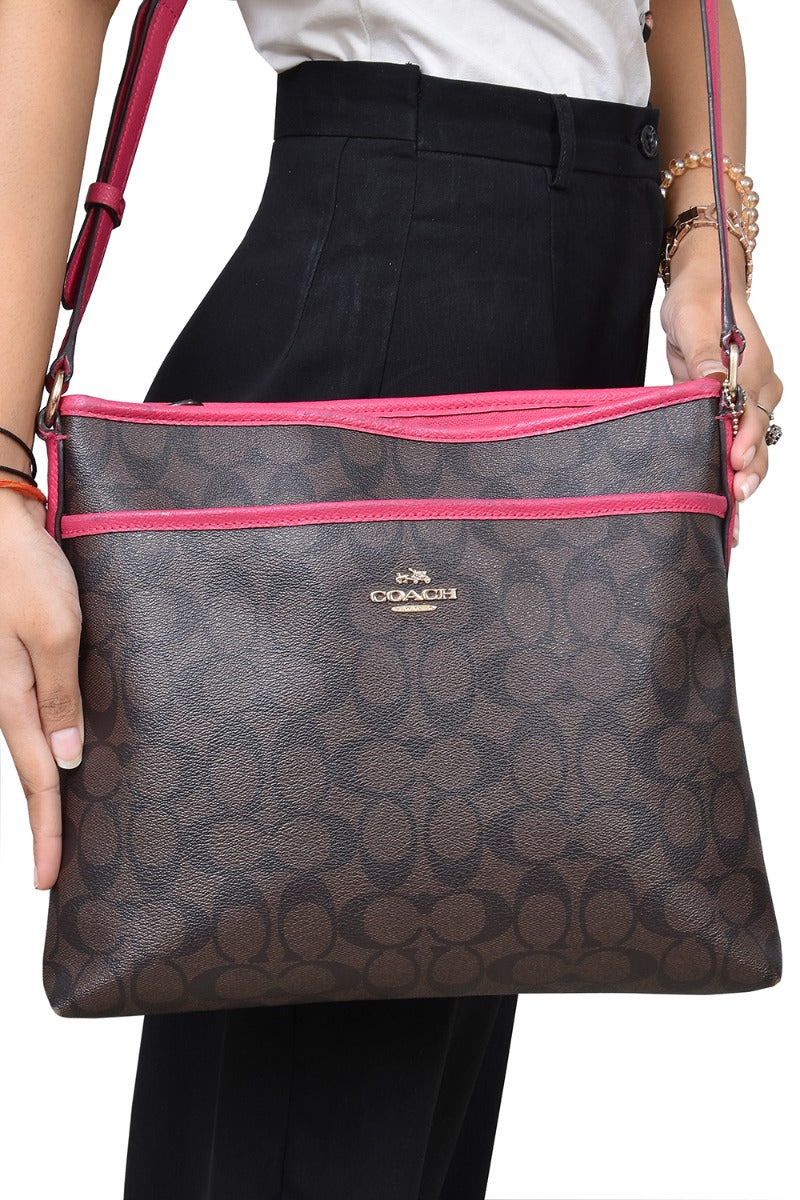 coach-monogram-east-west-crossbody-bag