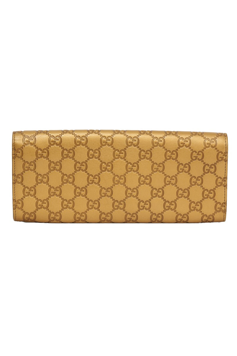 gucci-gold-broadway-golden-clutch