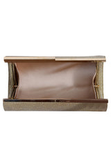 jimmy-choo-golden-shimmer-tube-clutch