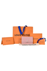 louis-vuitton-capucines-magnolia-compact-wallet