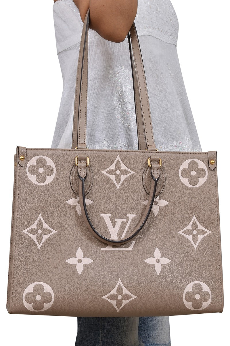 louis-vuitton-grey-on-the-go-handbag