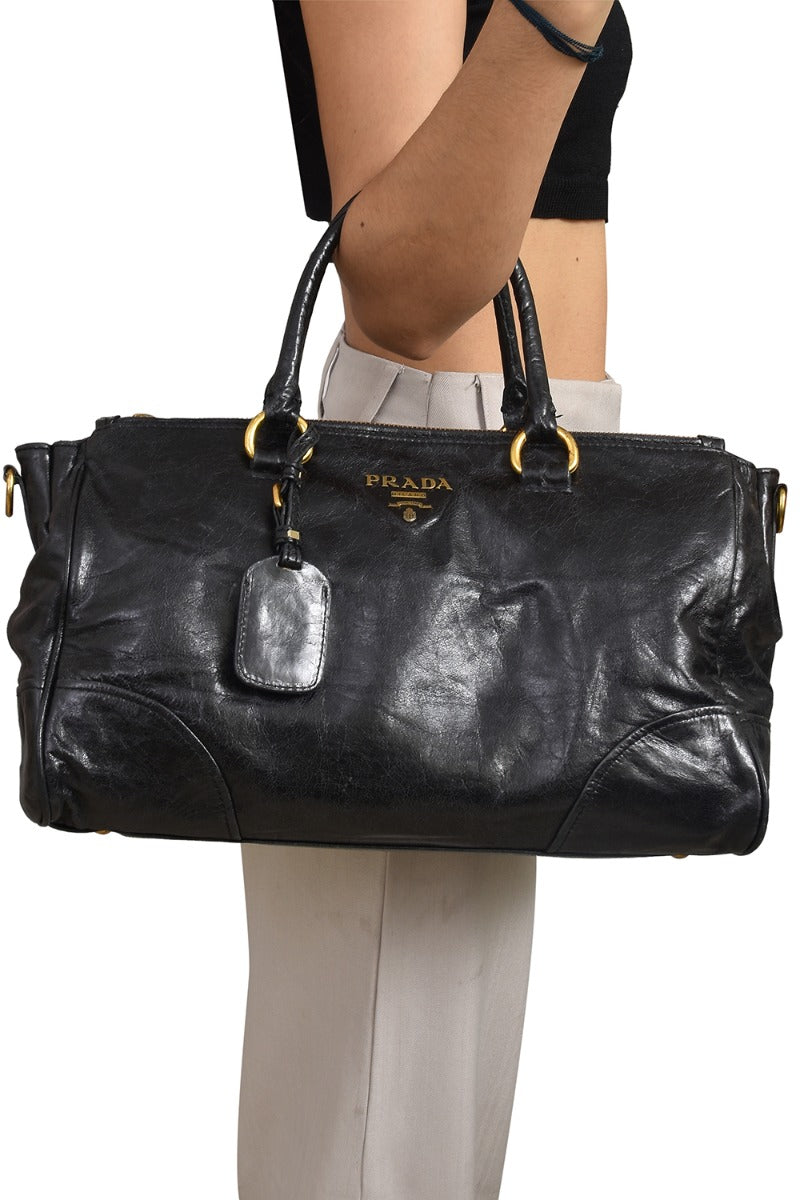 prada-black-glazed-leather-top-handle-bag