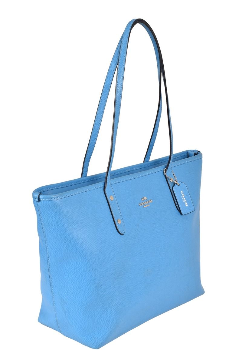 Lightly used baby blue coach bag - Depop
